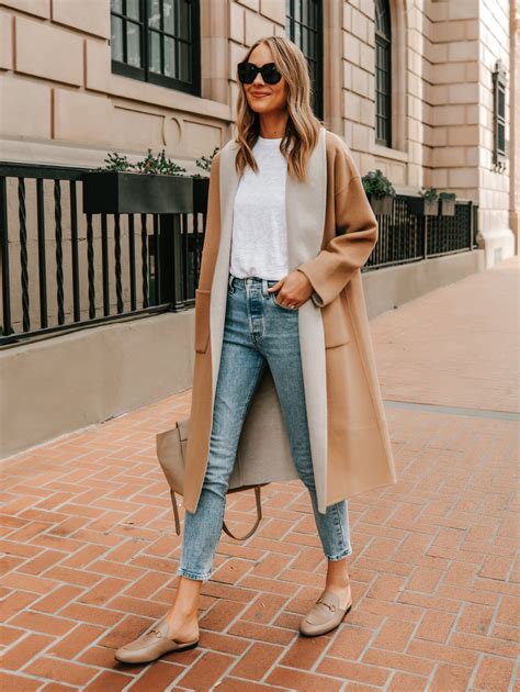 fashion blogger in blue fur sweater and gucci mules|Stylish Outfit Ideas for Gucci Fur Mules .